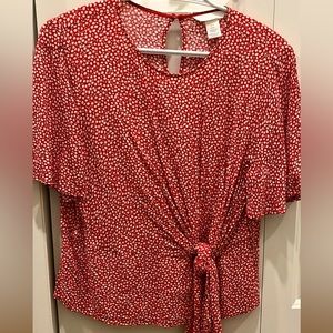 H&M red top with little white flowers, size 6